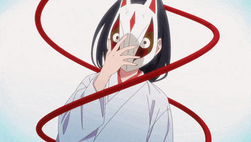 a girl with a fox mask covering her face