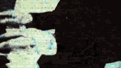 a silhouette of a man 's face is being projected on a brick wall .