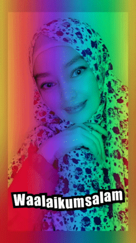 a woman wearing a hijab with the words waalaikumsalam written below her