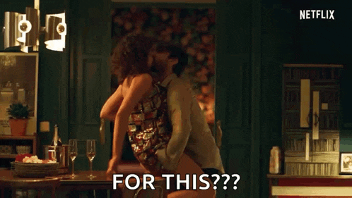 a man is holding a woman in his arms and says `` for this ? '' .