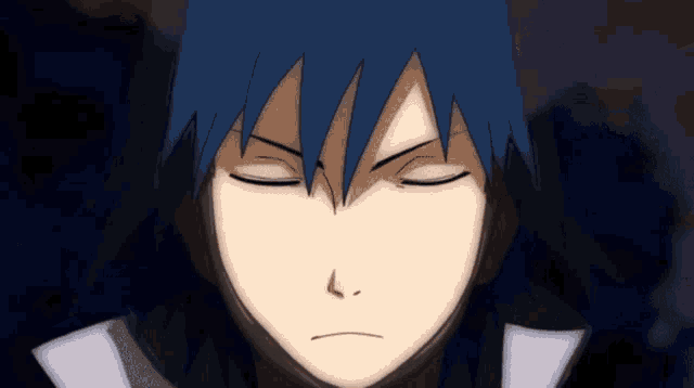 a close up of a cartoon character with his eyes closed
