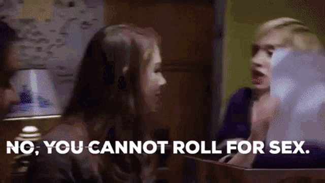 a group of women are sitting at a table and one of them says no , you cannot roll for sex