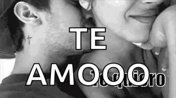 a black and white photo of a man and woman kissing with the words `` te amo '' written above them .