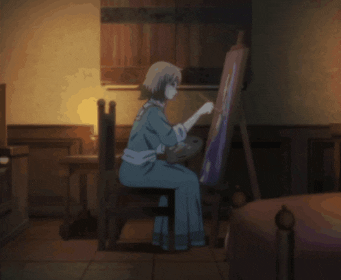 a woman is sitting in front of an easel painting
