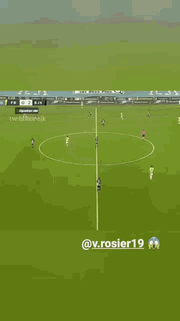 a soccer game is being played on a field with the name rosier19 on the bottom right