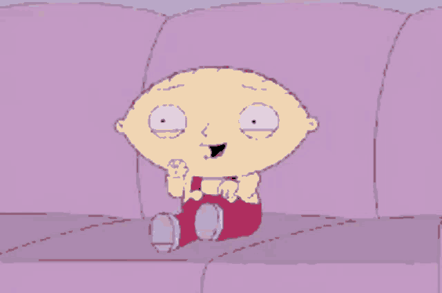 a cartoon character is sitting on a purple couch and smiling