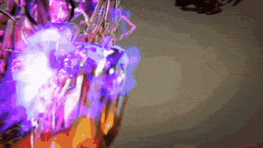 a purple light is coming out of a bottle