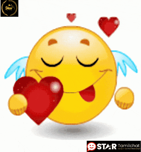 a smiley face with wings is holding a heart in its mouth
