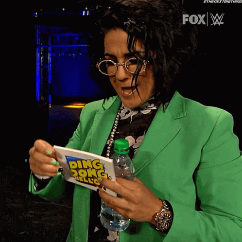 Bayley Ding Dong Hello Show GIF - Bayley Ding Dong Hello Show Reading GIFs