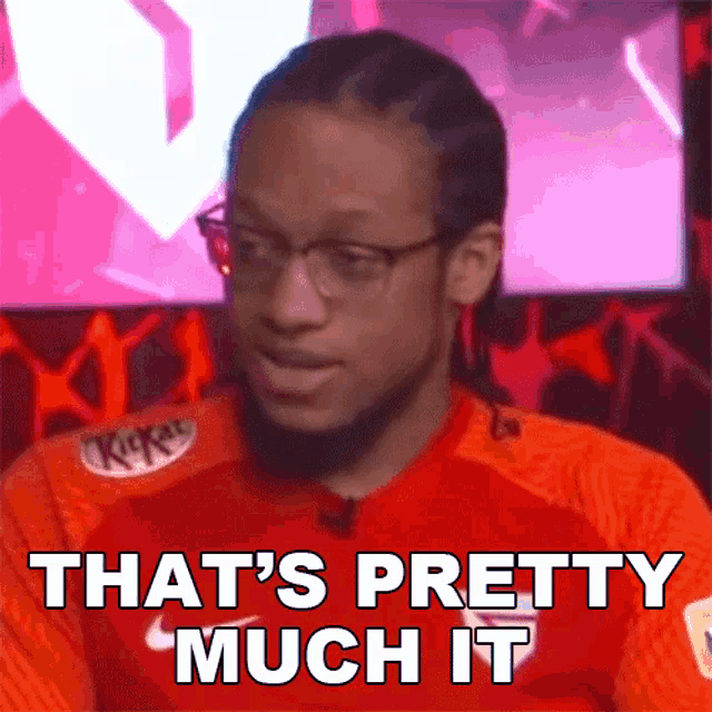 a man wearing glasses and a kitkat shirt says that 's pretty much it