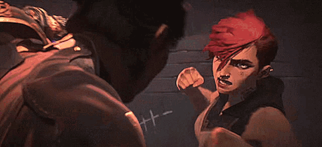 a man and woman are fighting in a dark room .