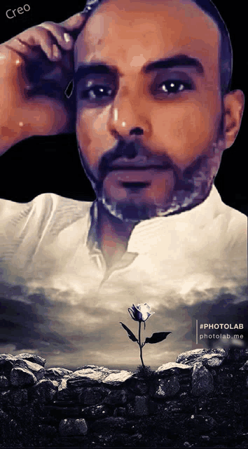 a man with a beard and a flower in front of him with the word creo on the bottom right
