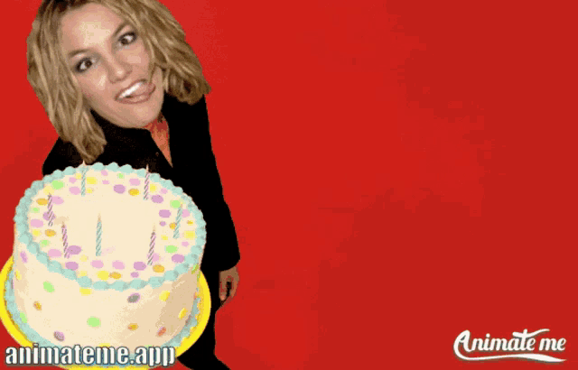britney spears is holding a birthday cake with candles and says happy birthday