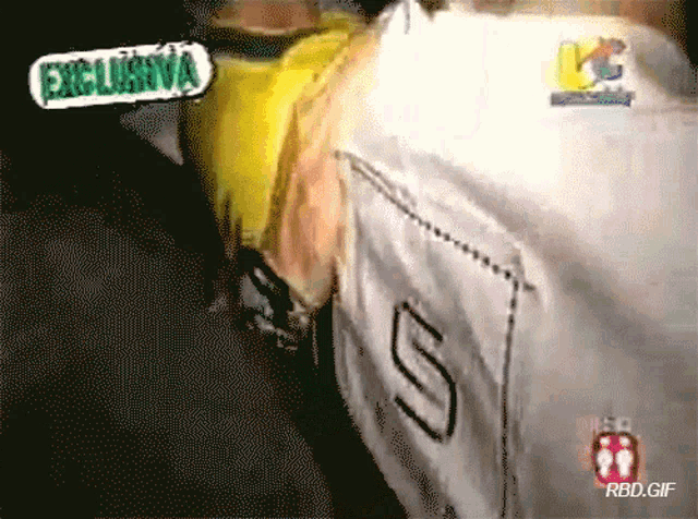 a yellow car with the number 5 on the back