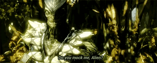 a statue of a man with the words do you mock me alien on it