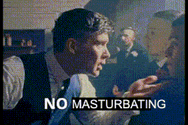 a man in a suit and tie is talking to another man with the words no masturbating above him .