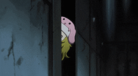 a pink stuffed animal is peeking out of a doorway