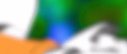 a blurry picture of a soccer ball with a green and white background .