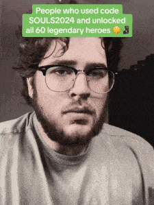 a man with glasses and a beard is wearing a shirt that says people who used code souls2024 and unlocked