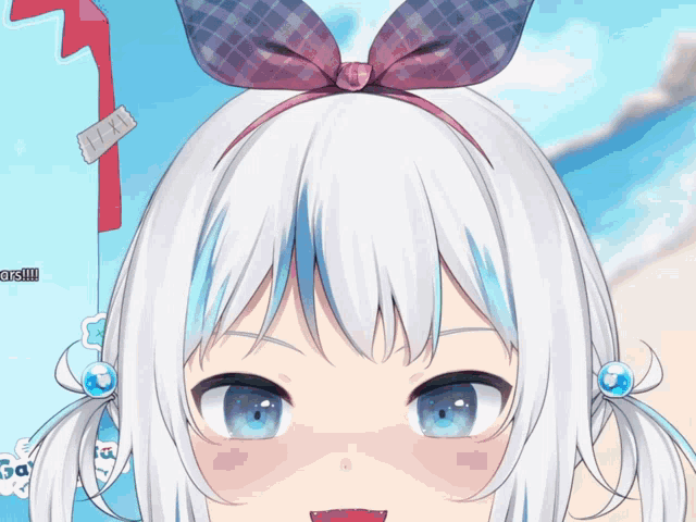 a close up of a girl 's face with a sticker that says ears !!!
