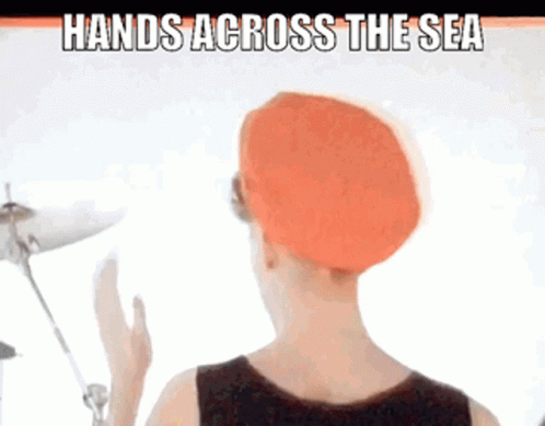 Modern English Hands Across The Sea GIF - Modern English Hands Across The Sea Reaching Out GIFs