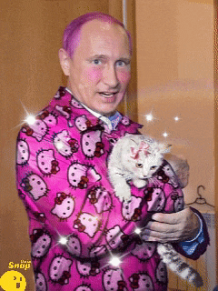 a man wearing a pink hello kitty jacket holds a white cat