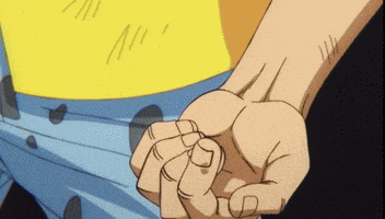 a close up of a person 's hand holding something
