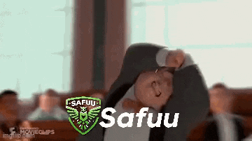 a man in a suit is laying on his back with his hands on his head and the words safuu written on the screen .