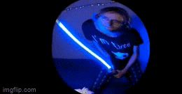 a person holding a light saber in a circle with imgflip.com written on the bottom