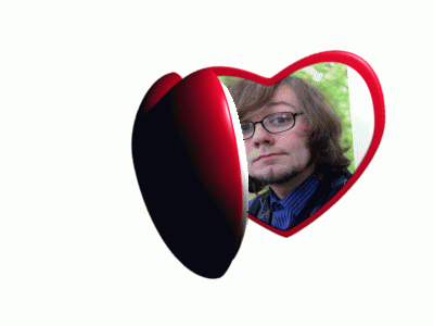 a heart shaped picture frame with a picture of a man