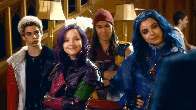 a group of descendants characters are posing for a picture together