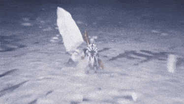 a person is standing in the snow with a sword in their hand