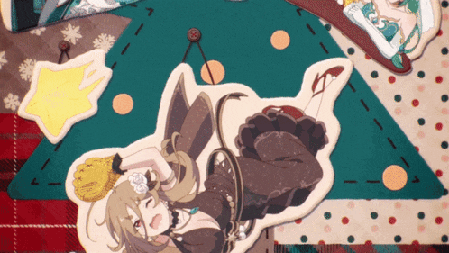 a christmas tree with a sticker of a girl laying down