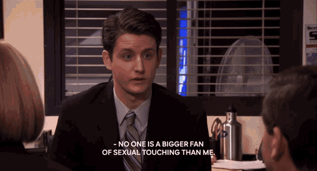 a man in a suit and tie says " no one is a bigger fan of sexual touching than me .. "