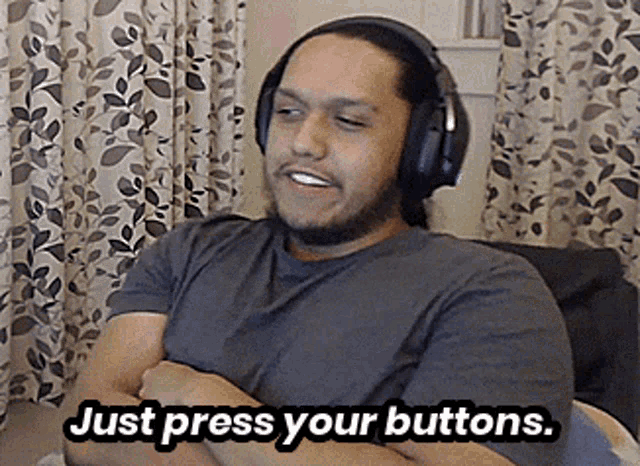 a man wearing headphones has the words just press your buttons written below him
