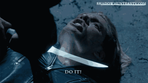 a man is laying on the ground with a knife in his neck and the words do it