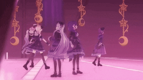 a group of anime characters are dancing on a stage in a purple room .