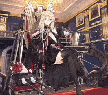a woman in a black dress is sitting on a chair
