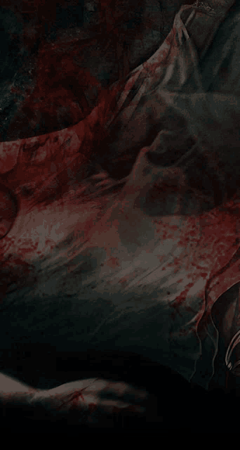 a close up of a bloody cloth that looks like a ghost