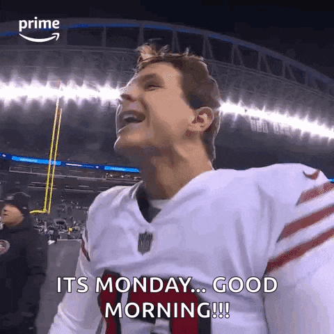 a football player is smiling and saying it 's monday ... good morning .