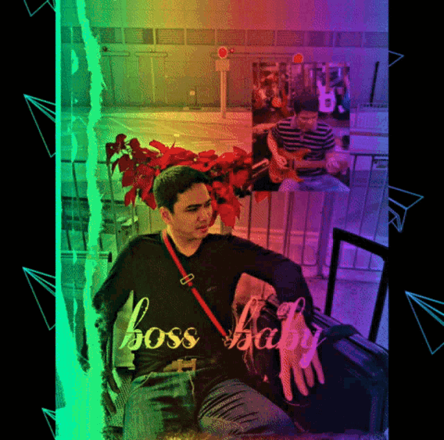 a man wearing a shirt that says " boss baby "