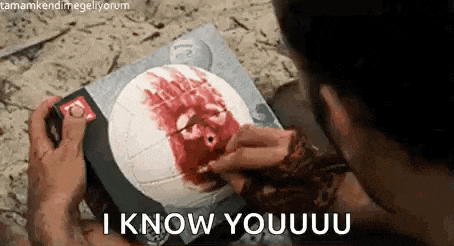 a man is playing a video game with a bloody face on it and says `` i know youuu '' .