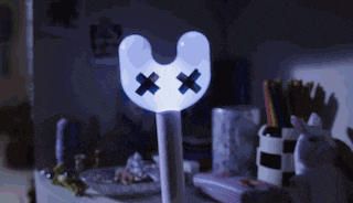 a blue object with two crosses on it
