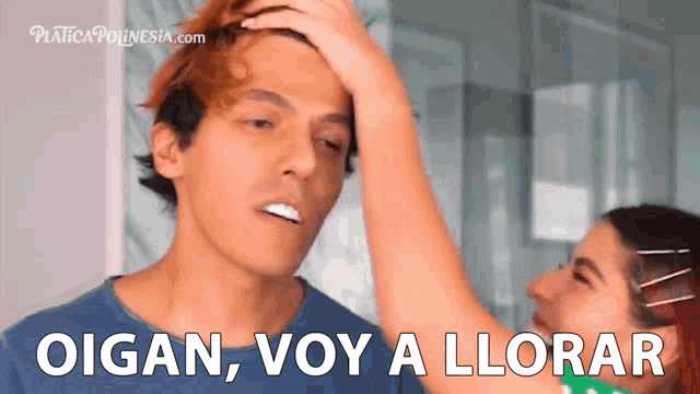 a woman is touching a man 's head with the words " oigan voy a llorar " on the bottom