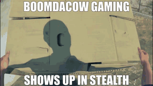 a person is holding a piece of cardboard with a shadow of a man on it and the words boomdacow gaming