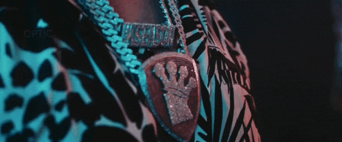 a close up of a person 's neck with a necklace that says ' optic ' on it