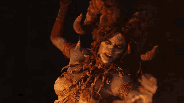 a woman with horns on her head is dancing