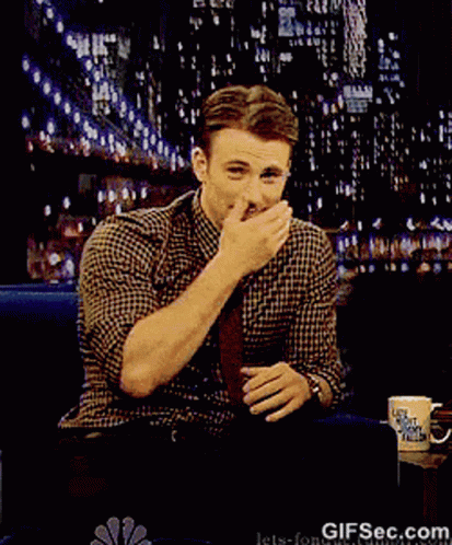 Chris Evans Cover Mouth GIF - Chris Evans Cover Mouth Chuckle GIFs