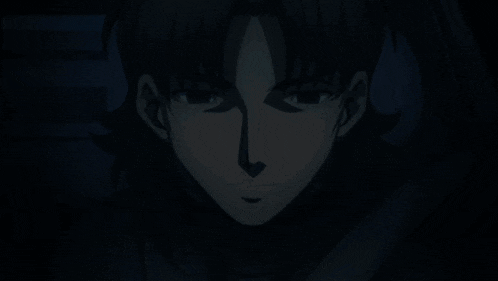 a close up of a person 's face with a shadow on it