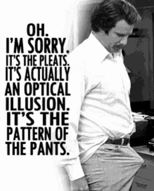 a man in a white shirt is standing in front of a sign that says " oh sorry it 's the pleats